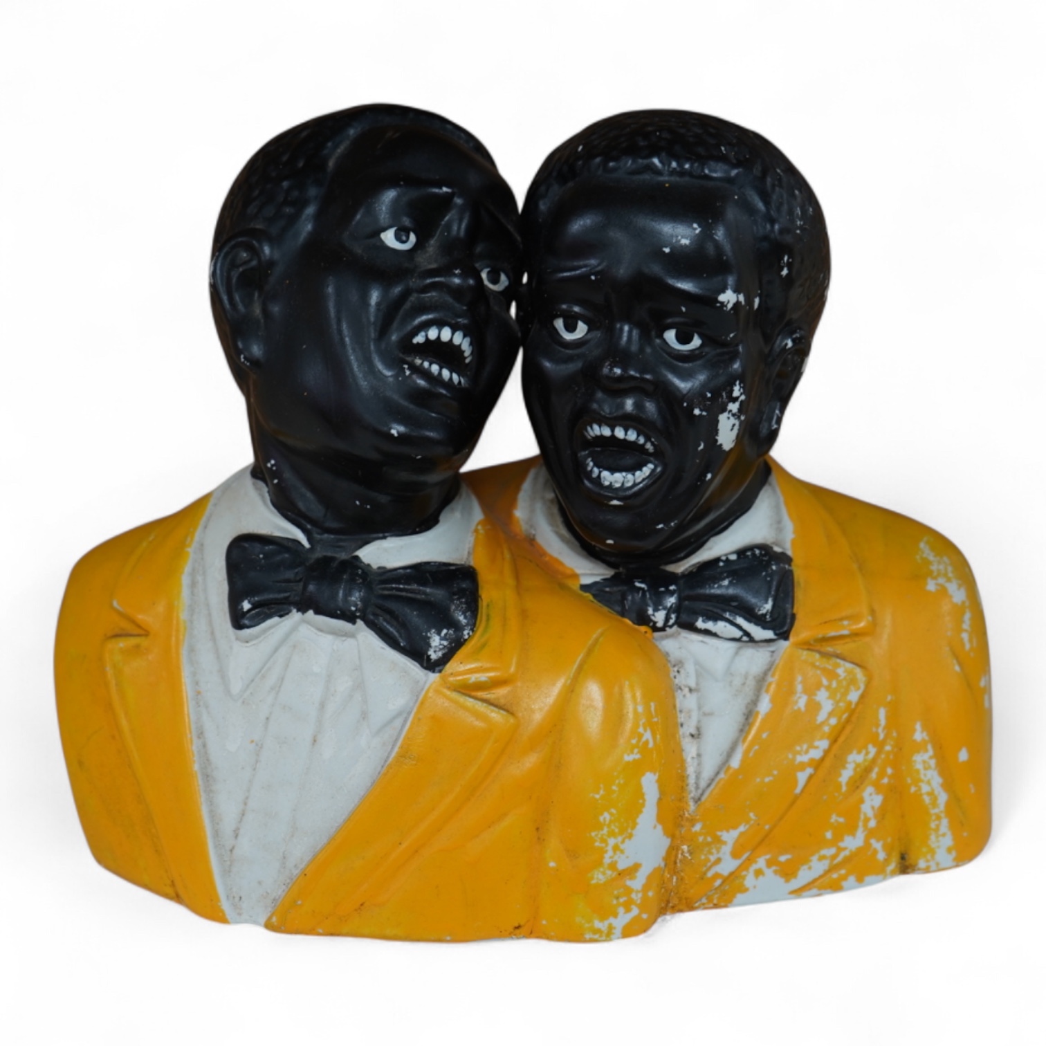 A 20th century Americana ceramic figure group of two jazz singers, 25cm wide